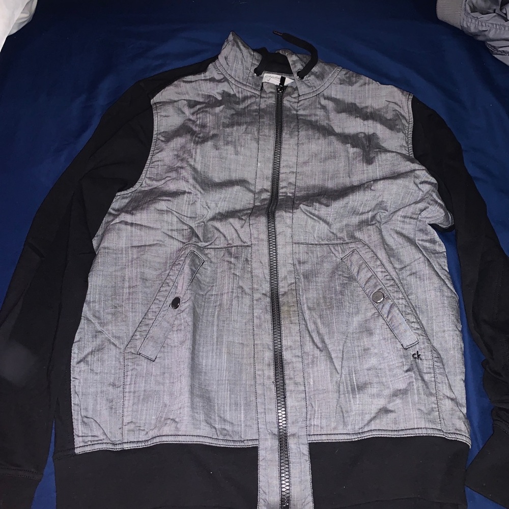 Black/ Grey Calvin Klein hoodie very warm and lightweight used twice doesn’t fit